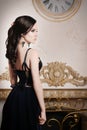 Woman in long lace deep blue dress. Retro, vintage style Royalty Free Stock Photo