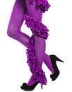 Woman long legs and purple stockings isolated Royalty Free Stock Photo