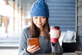 Woman look at cellphone at outdoor cafe Royalty Free Stock Photo