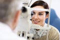 Woman look in ophthalmoscope Royalty Free Stock Photo