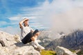 Woman looking ahead on top of the mountain Royalty Free Stock Photo