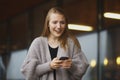 Woman looking angry at the phone