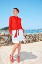 Woman looking aside in front of scenery overlooking lagoon Royalty Free Stock Photo