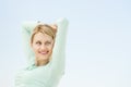 Woman Looking Away With Arms Raised Against Clear Sky Royalty Free Stock Photo