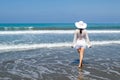 Woman looking away at the sea on the beach Royalty Free Stock Photo