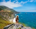 Woman  looking at beautiful coastal scenery in California Royalty Free Stock Photo