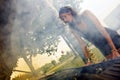 Woman looking at blown engine