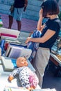 woman looking at books in a flea market in Santa Cruz de Tenerife. Canary Islands