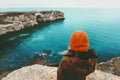 Woman looking at cold sea view alone