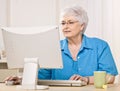 Woman looking at computer monitor Royalty Free Stock Photo