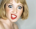 Woman looking crazy. Royalty Free Stock Photo