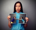 Woman looking at disrupt photo