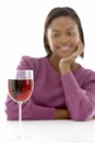 Woman Looking At Glass Of Wine Royalty Free Stock Photo