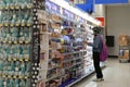 Woman looking health and beauty products in Walmart store