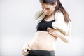 Woman looking at her flat stomach after training Royalty Free Stock Photo