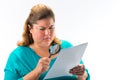 Woman looking through magnifying glass Royalty Free Stock Photo