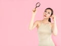 Woman looking with magnifying glass up Royalty Free Stock Photo