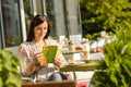 Woman looking at menu cafe bar terrace Royalty Free Stock Photo