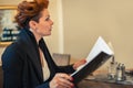 Woman looking at the menu Royalty Free Stock Photo