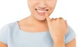 Woman looking in mirror and checking teeth