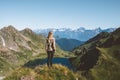 Woman looking at mountain lake view travel adventure hiking outdoor active healthy lifestyle Royalty Free Stock Photo