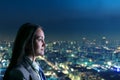 Woman looking at night city Royalty Free Stock Photo