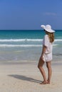 Woman looking out to the ocean. Royalty Free Stock Photo