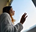 Woman looking out the window Royalty Free Stock Photo