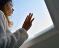 Woman looking out the window Royalty Free Stock Photo