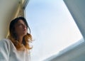 Woman looking out the window Royalty Free Stock Photo