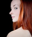 Woman looking over her shoulder. Royalty Free Stock Photo