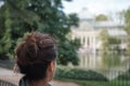 Woman looking at Palacio de Cristal, The Crystal Palace - Madrid Spain Royalty Free Stock Photo