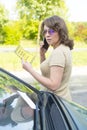 Woman looking on parking ticket Royalty Free Stock Photo