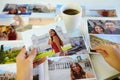 Woman looking at photos, remember nostalgia for a day of rest Royalty Free Stock Photo