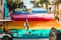 Woman looking at Rainbow Stairs in Isla Mujeres Island Mexico