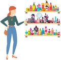 Woman looking at shelf with female accessories and perfumes. Lady choosing cosmetics and perfumery Royalty Free Stock Photo
