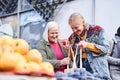 Woman looking into the shopper bag Royalty Free Stock Photo