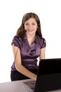 Woman looking and smiling with laptop Royalty Free Stock Photo