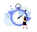 Woman looking at stopwatch and counting seconds. Concept of marketing project launch optimization, perfect timing, time. Royalty Free Stock Photo