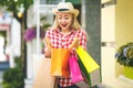 Woman looking surprised into her shopping bags gifts excited with what she has realizing she forgot something in the store having Royalty Free Stock Photo
