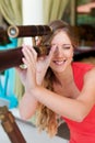 Woman looking through the telescope Royalty Free Stock Photo