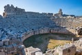 Woman looking at theater of Xanthos ancient city