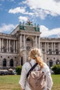 Woman looking to Hofburg in Vienna. Tourist traveling in Austria Royalty Free Stock Photo