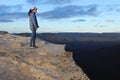 Woman looks at the landscape from Lincoln Rock Lookout at sunrise Royalty Free Stock Photo