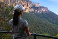 Woman looks at the landscape of The Three Sisters rock formation Royalty Free Stock Photo