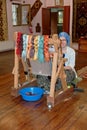 Woman at loom in the showroom of carpet factory in Denizli, Turkey