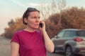 Woman lost during car driving talking on mobile phone