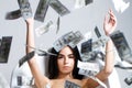 Woman with lot of money. Millionaire woman lying in bedroom. Sexy woman lying in dollar bills. Rich sexy woman lies on Royalty Free Stock Photo