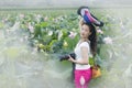 Woman in lotu fields