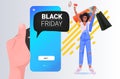 Woman with loudspeaker and shopping bags buying online in mobile app black friday big sale concept full length Royalty Free Stock Photo